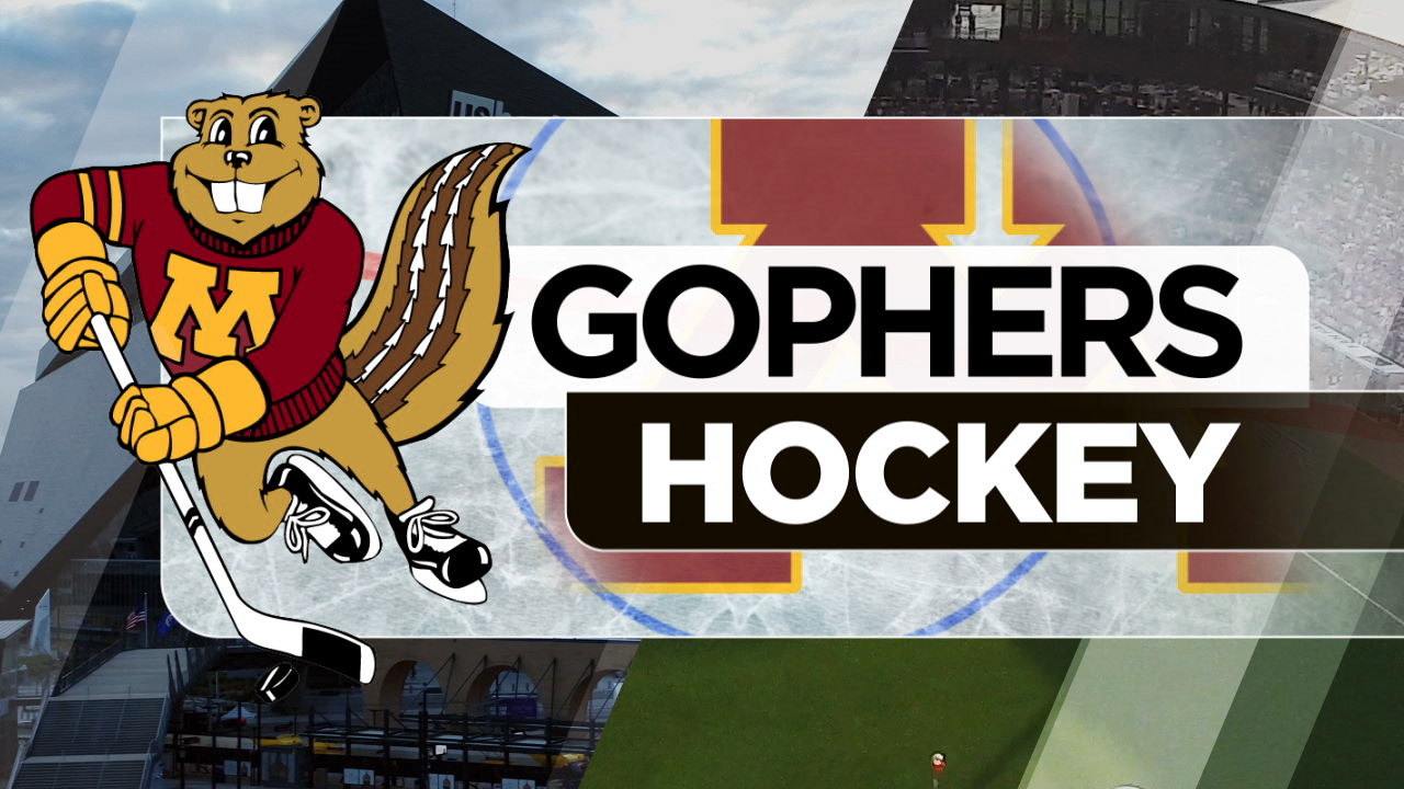 Gophers hockey team in action during the game against Penn State